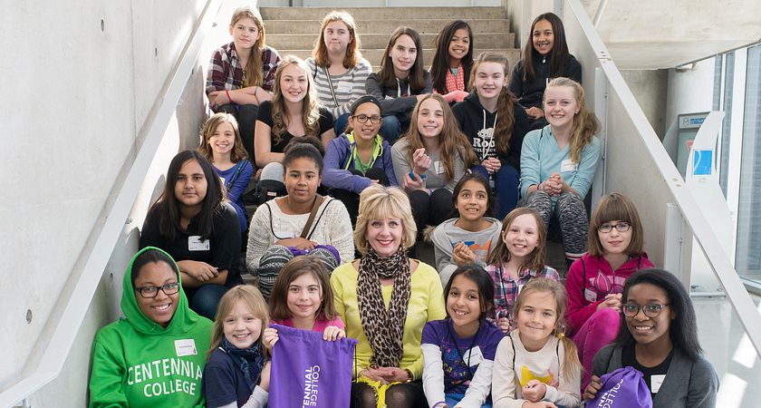 picture of President Ann Buller with a group of young girls visiting from Toronto middle schools